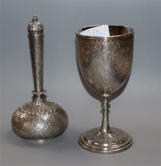 Two Indian white metal goblet and a similar bottle vase and cover,